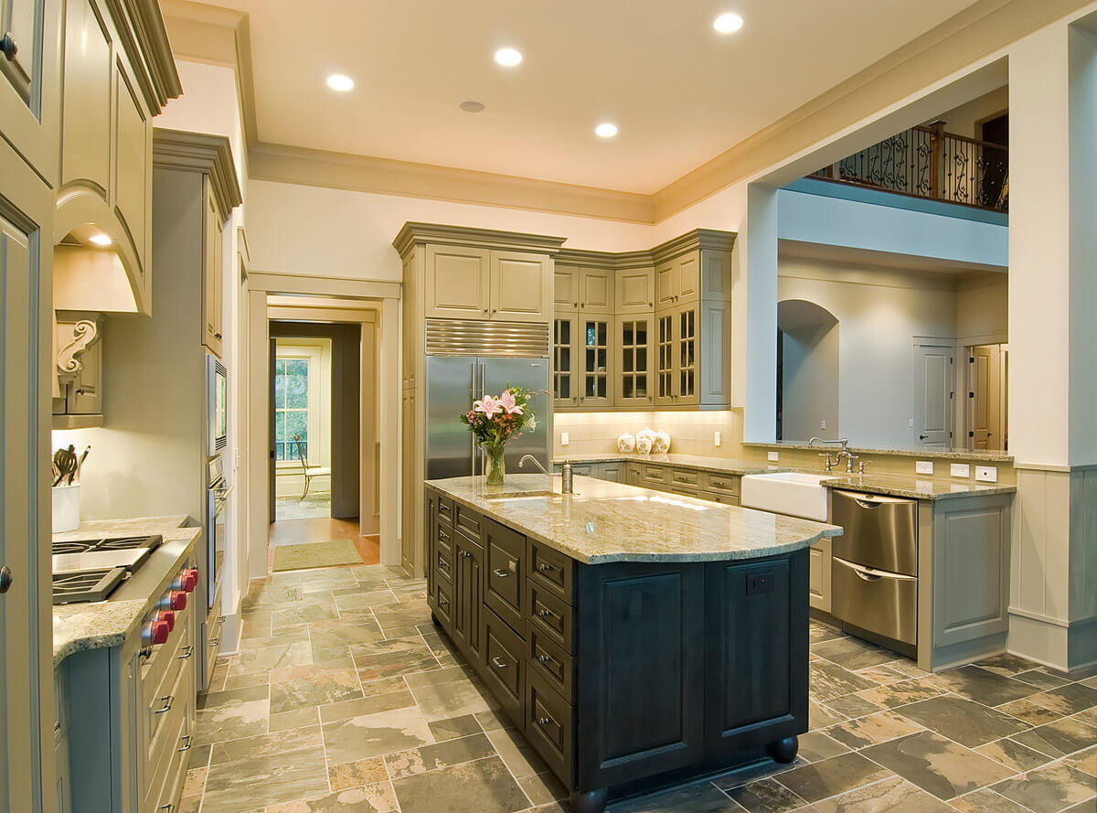 Home kitchen remodel with stainless steel appliances, cabinet lighting and granite countertops