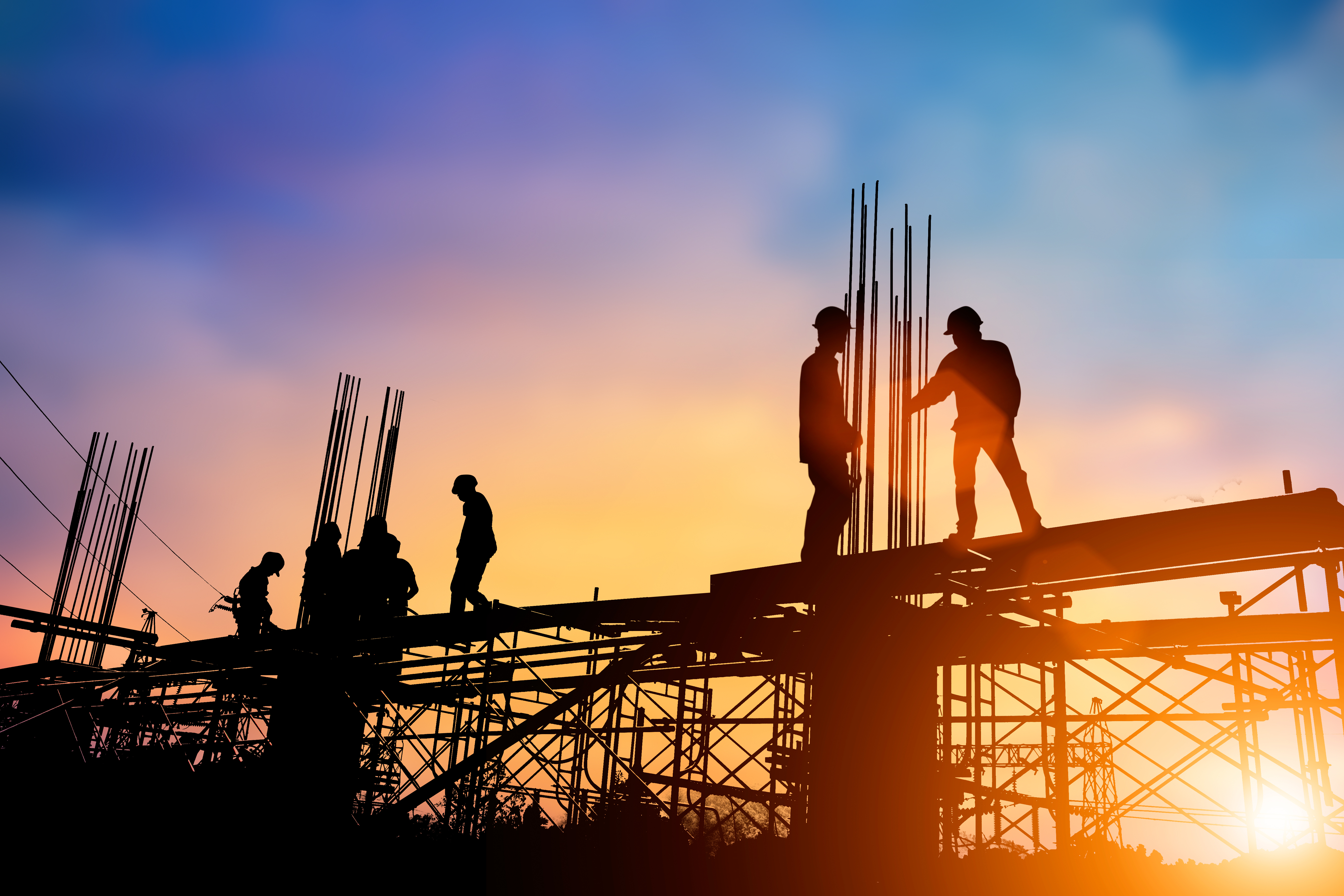 Home builders working on a new home construction site